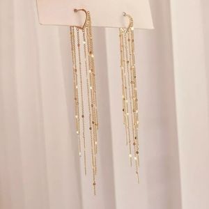 Gold long drop earrings